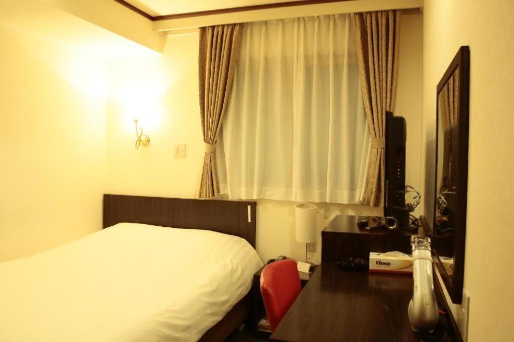 Hotel New Takada Präfektur Tokio Zimmer foto